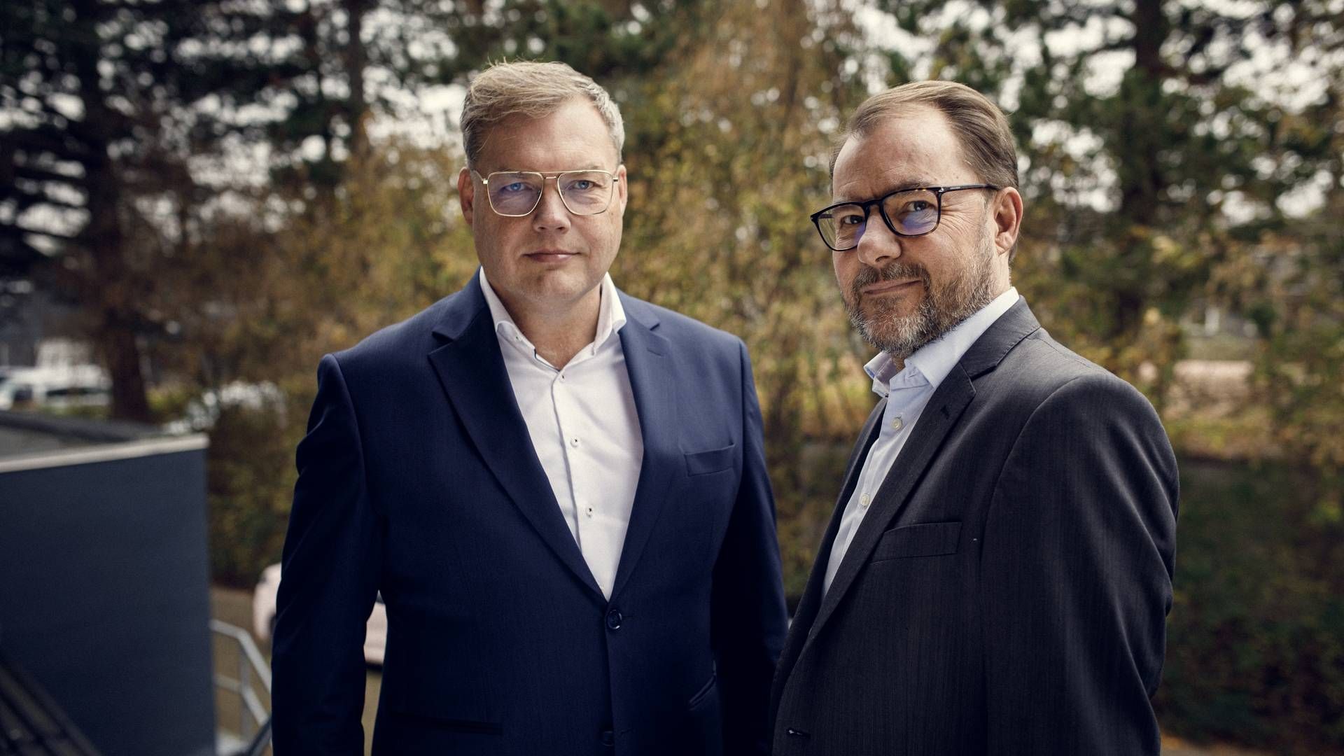 Holger Brøns Jensen, CEO i Asseco Danmark (tv) samt Claus Moldow, direktør for Globeteam. | Foto: PR