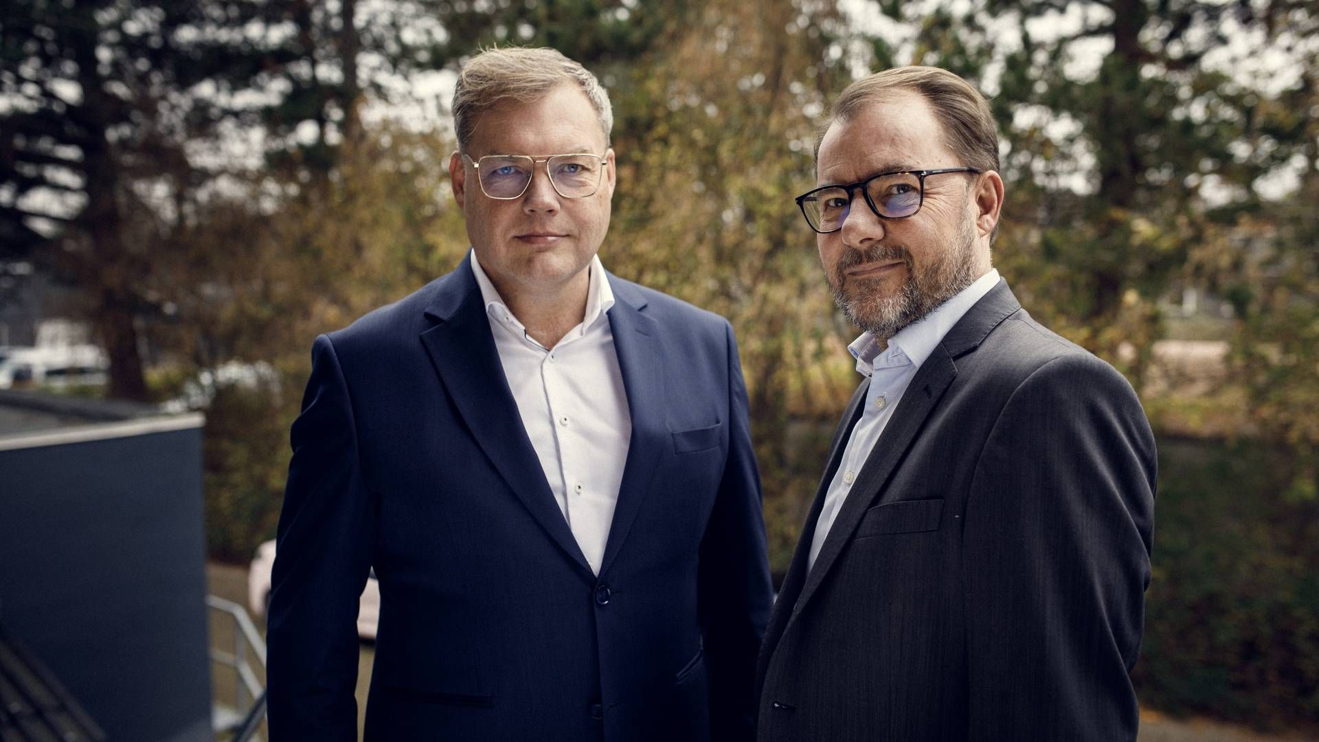 Holger Brøns Jensen (tv.), adm. direktør i Asseco Danmark, og Claus Moldow, adm. direktør i Globeteam | Foto: PR