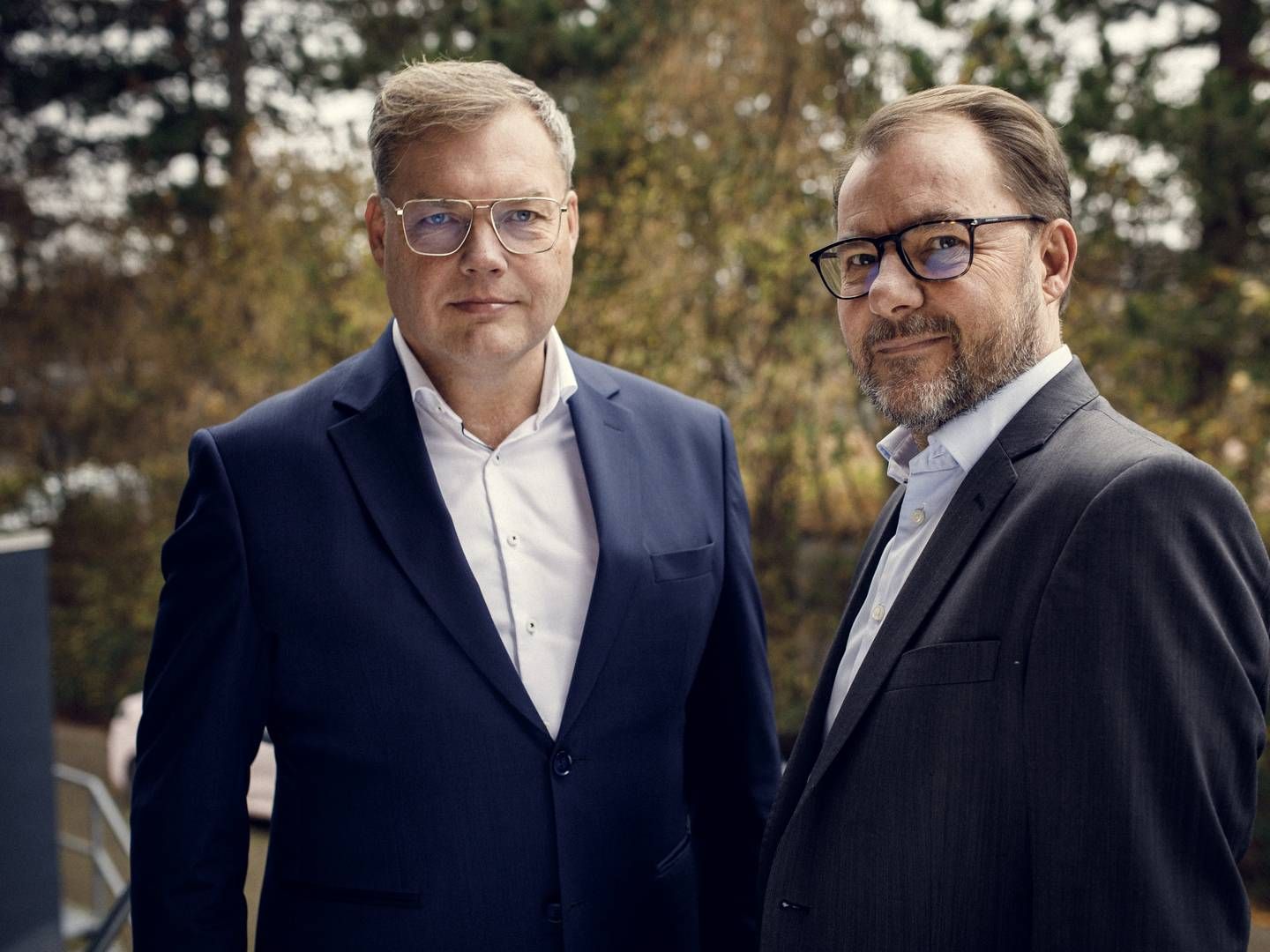 Holger Brøns Jensen (tv.), adm. direktør i Asseco Danmark, og Claus Moldow, adm. direktør i Globeteam | Foto: PR