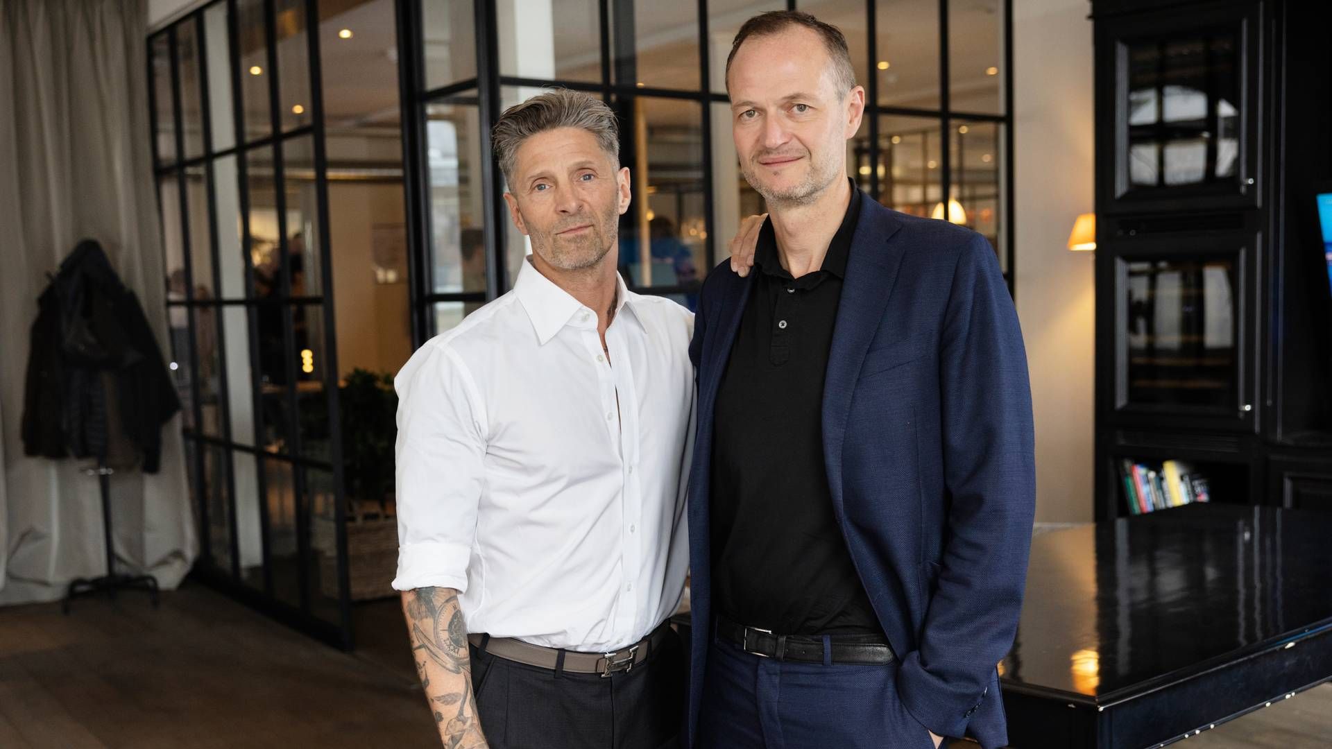 Stifter Kaspar Basse (tv) og adm. direktør af Joe & The Juice Thomas Nørøxe fejrede sidste år 20 års jubilæum for juicekæden. | Foto: Gregers Tycho