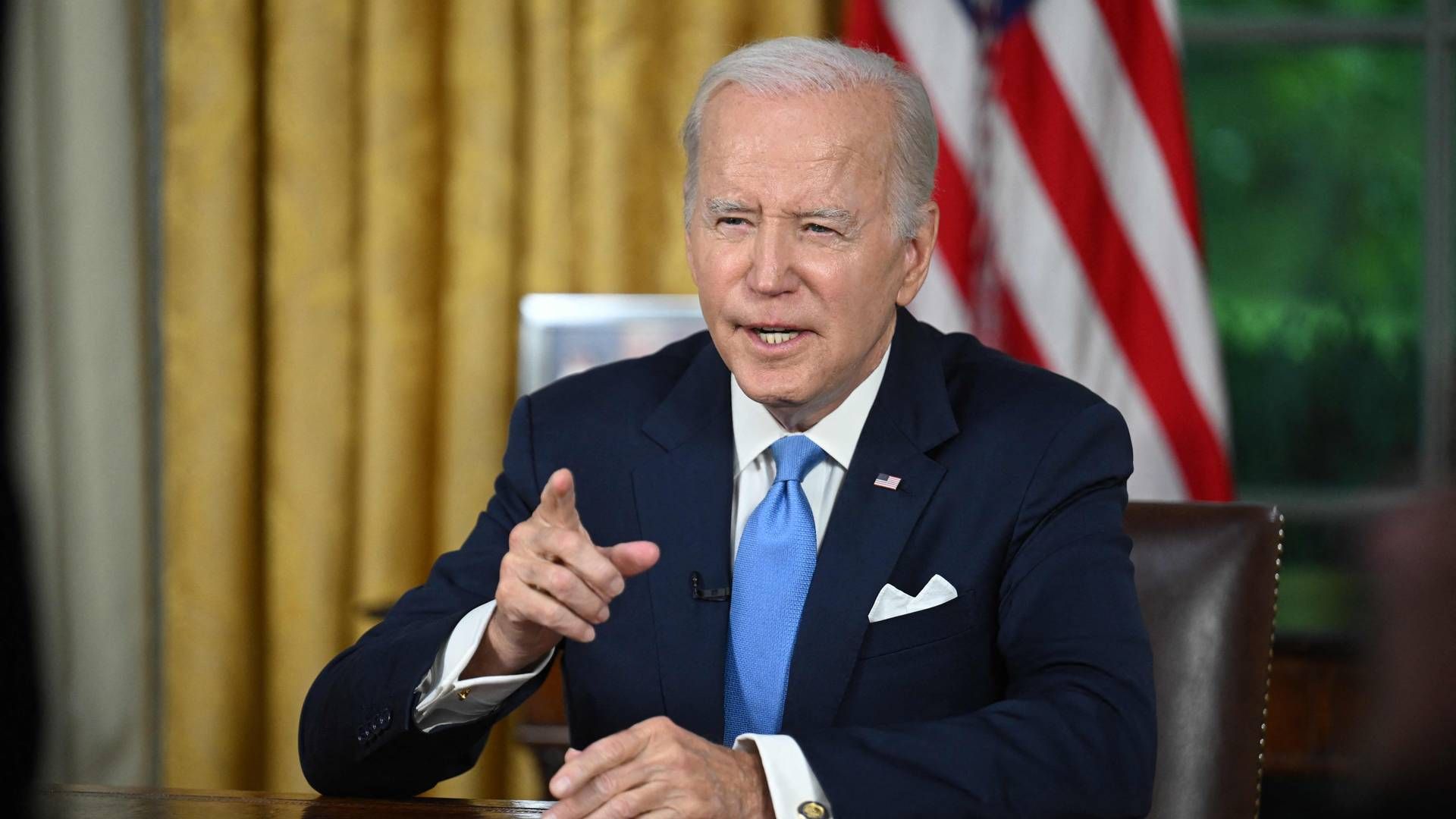 "Det var afgørende at nå til enighed, og det er rigtig gode nyheder for det amerikanske folk,” siger Biden i talen fra Det Ovale Værelse natten til lørdag dansk tid. | Foto: Jim Watson/AFP/Ritzau Scanpix