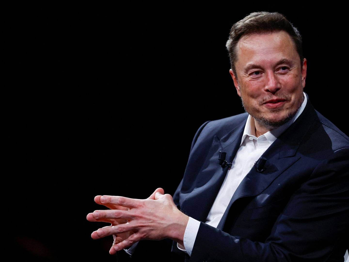 The 'peace' agreement was signed at a ceremony at the China Auto Forum. Pictured is Tesla's CEO, Elon Musk. | Photo: Gonzalo Fuentes/Reuters/Ritzau Scanpix