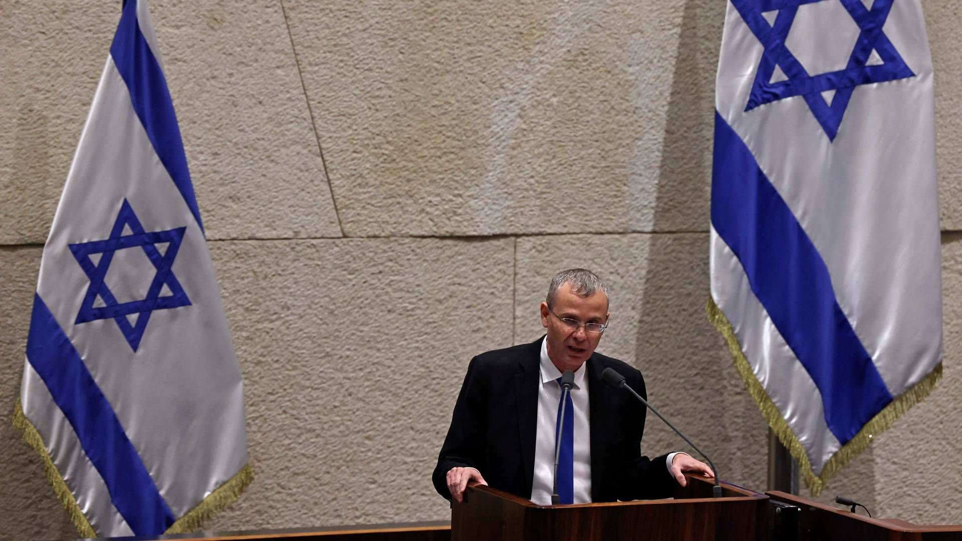 Israels justitsminister, Yariv Levin, under debatten mandag i Knesset. | Foto: Ronaldo Schemidt/AFP/Ritzau Scanpix