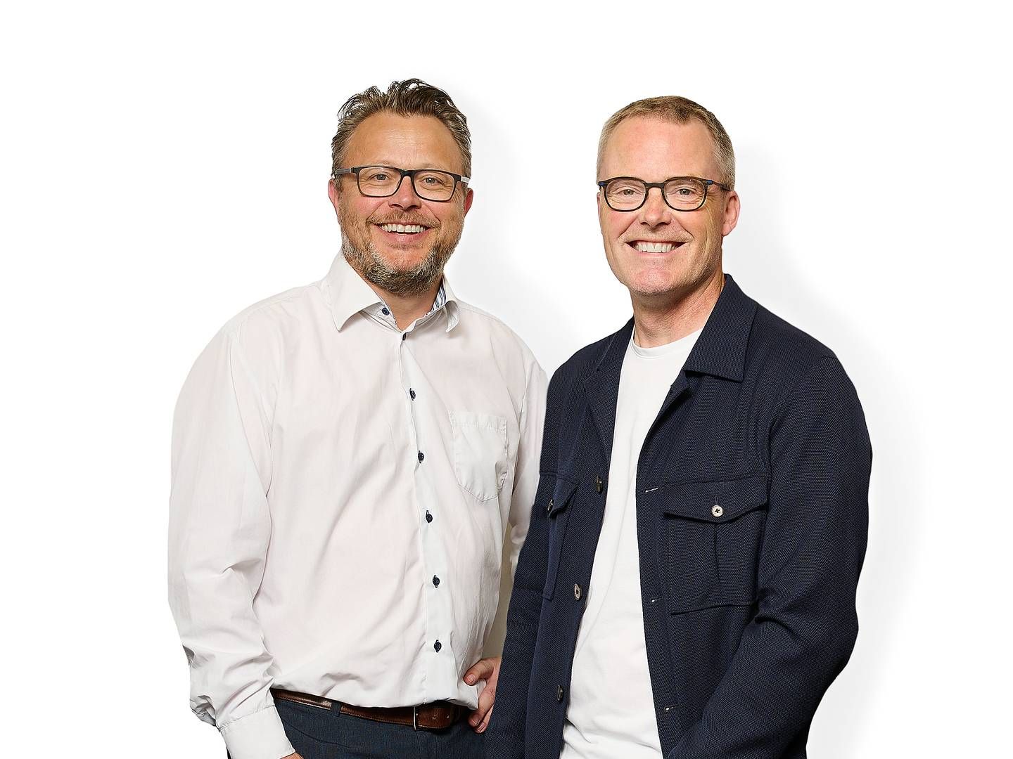 Leif Lindås (tv.) er stifter og adm. direktør i Ivision, mens Jesper Byskov (th.) er partner i virksomheden, der nu er blevet opkøbt af Visma. | Foto: Pr