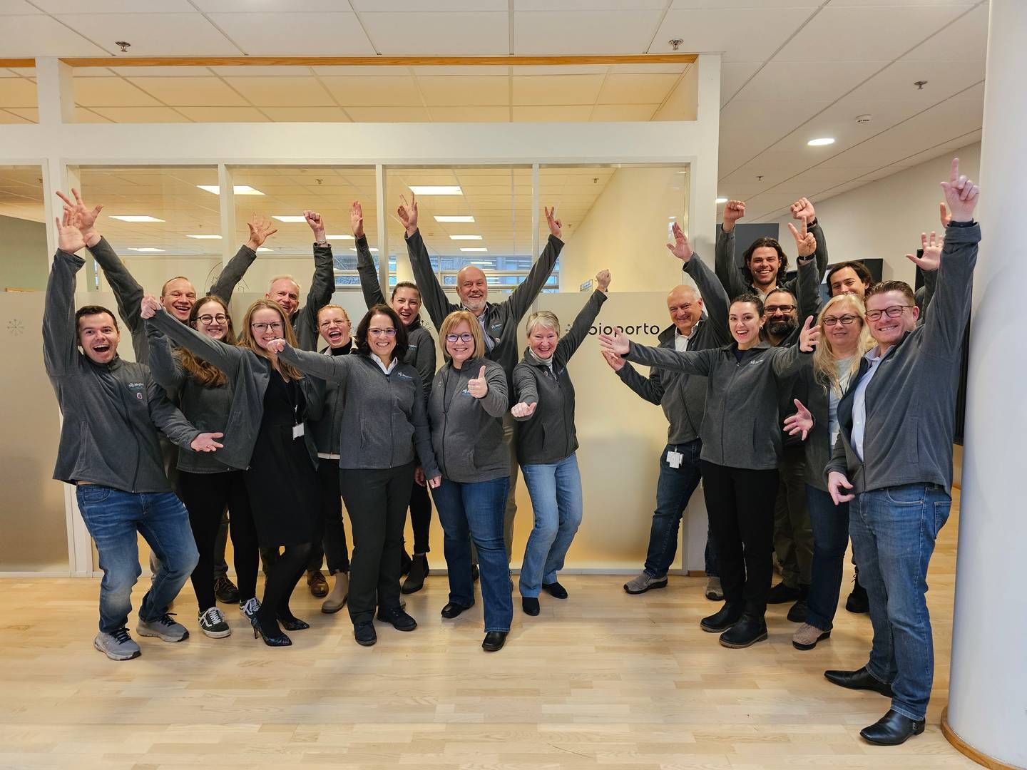 CEO Tony Pare (seventh from right) and his colleagues celebrate the approval at the Bioporto headquarters | Photo: Bioporto / Pr