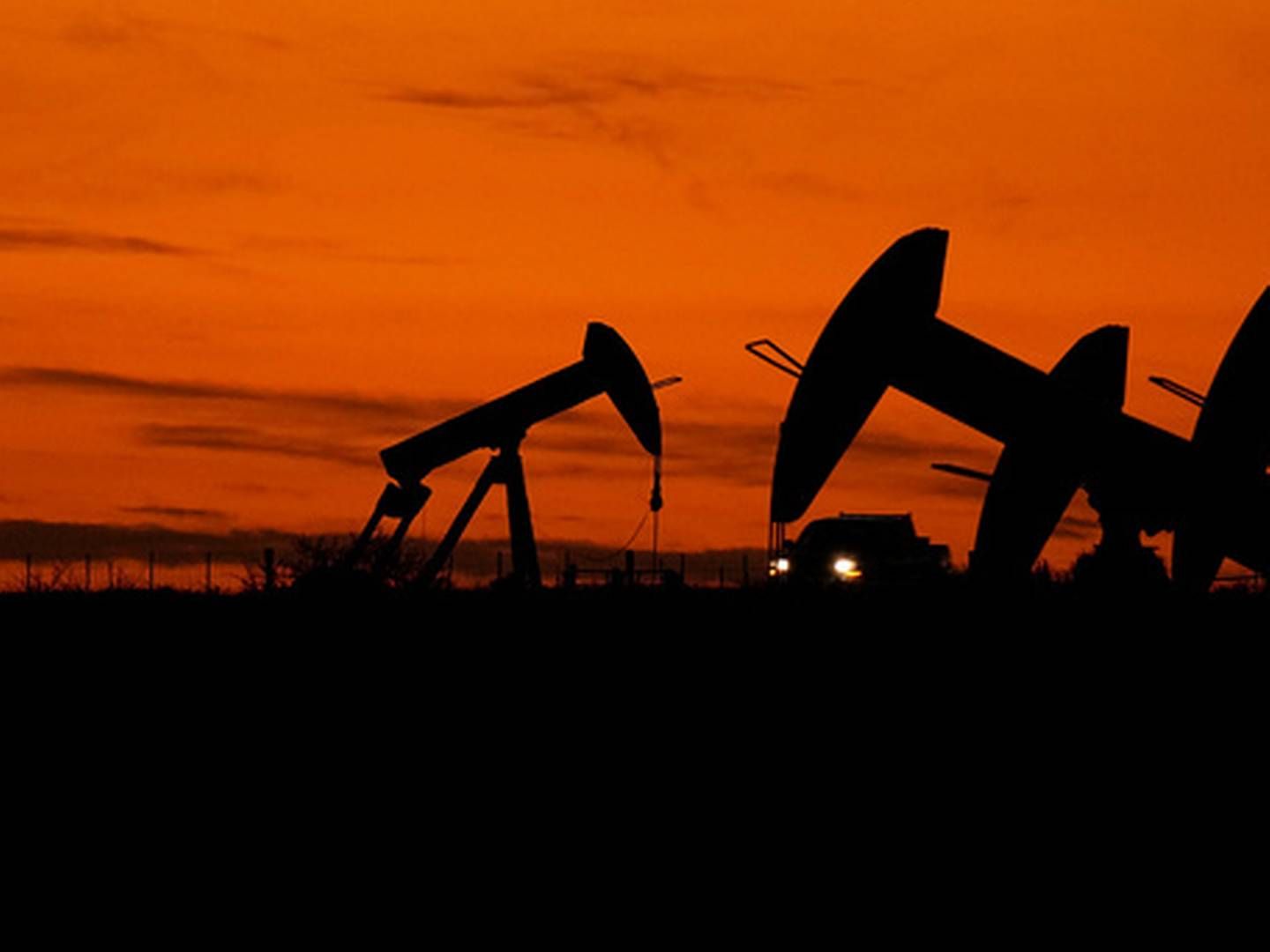 TROR PÅ OPPSVING: Oljekartellet Opec forventer en solid økning i etterspørselen neste år. Bildet viser oljepumper på et anlegg ved Karnes City i Texas. | Foto: Eric Gay / AP / NTB