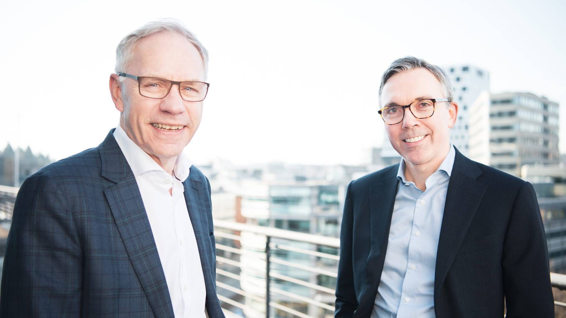 Raymond Carlsen (left), former CEO of Scatec, and current CEO Terje Pilskog. | Photo: Scatec