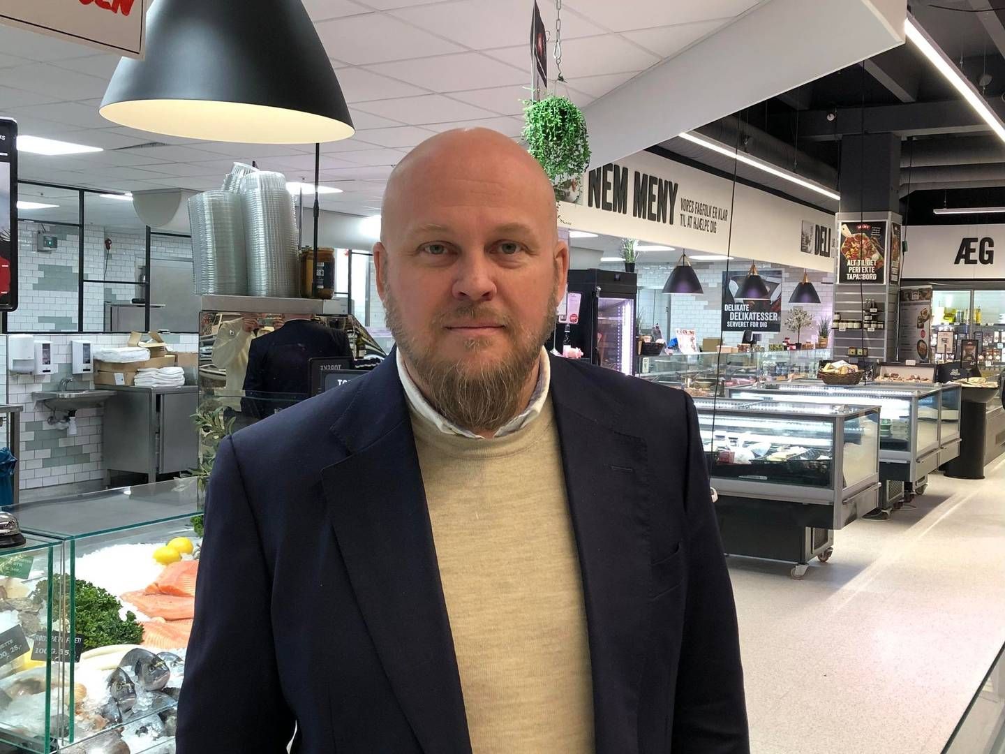 Richo Boss var en tilfreds mand, da han sammen med købmanden i butikken på Borups Allé i København kunne vise justitsministeren rundt. | Foto: Alexander Thorup/detailwatch