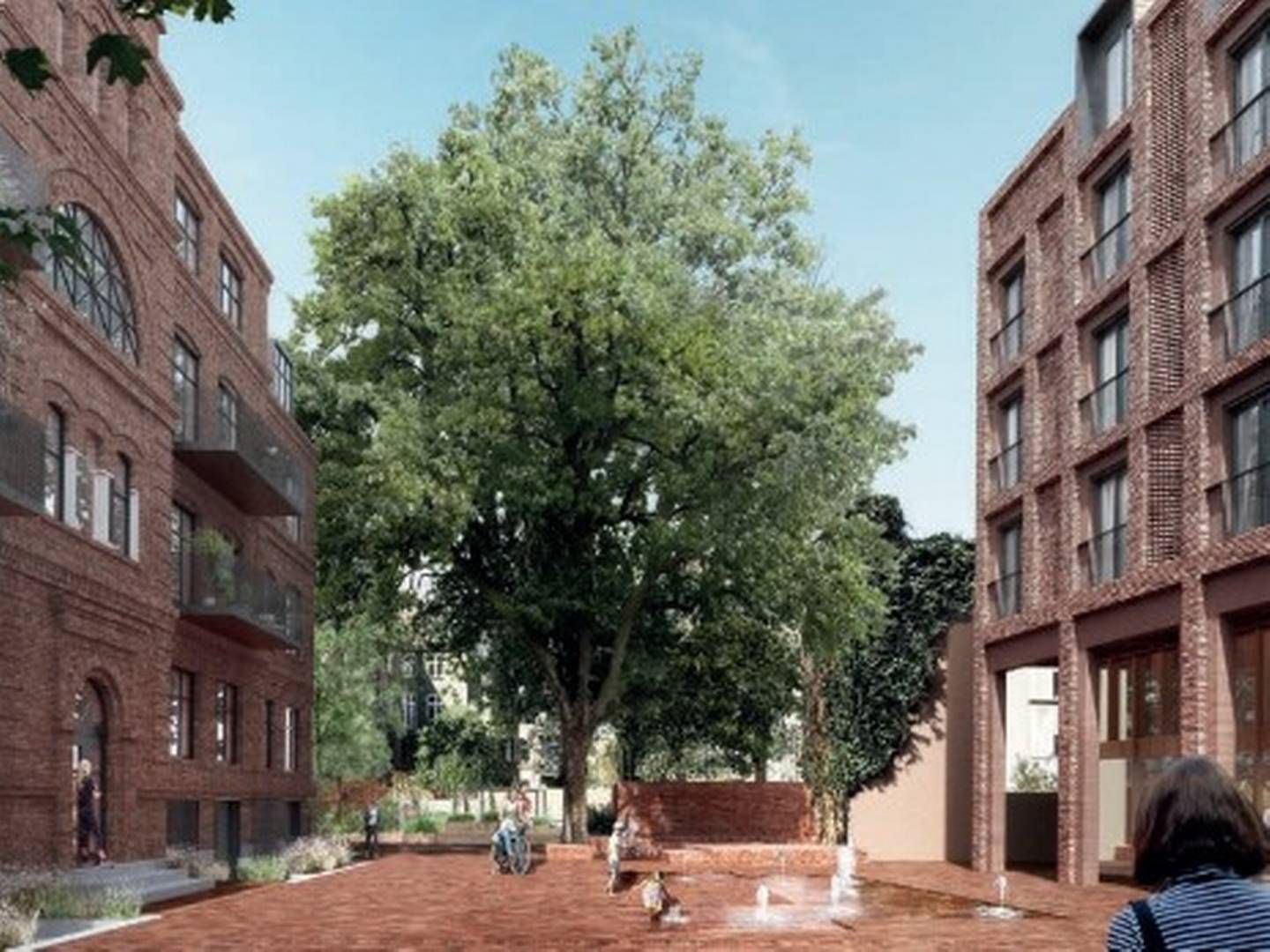 Boliger skal udfylde mere end 160 år gamle skolebygninger på Frederiksberg. Til højre ses en nybygning, mens bygningen til venstre er en eksisterende bygning, der renoveres og nyindrettes. Visualisering: Frederiksberg Kommune.