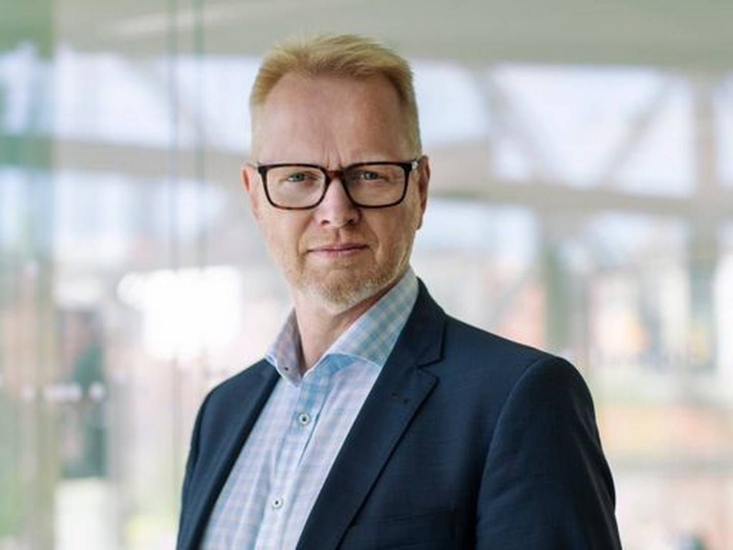 Direktør i DI Byggeri Anders Stouge er en af flere, som glæder sig over regeringens brede aftale klimavenlige aftale for fremtidens byggerier. | Foto: Sif Meincke / PR / Dansk Industri