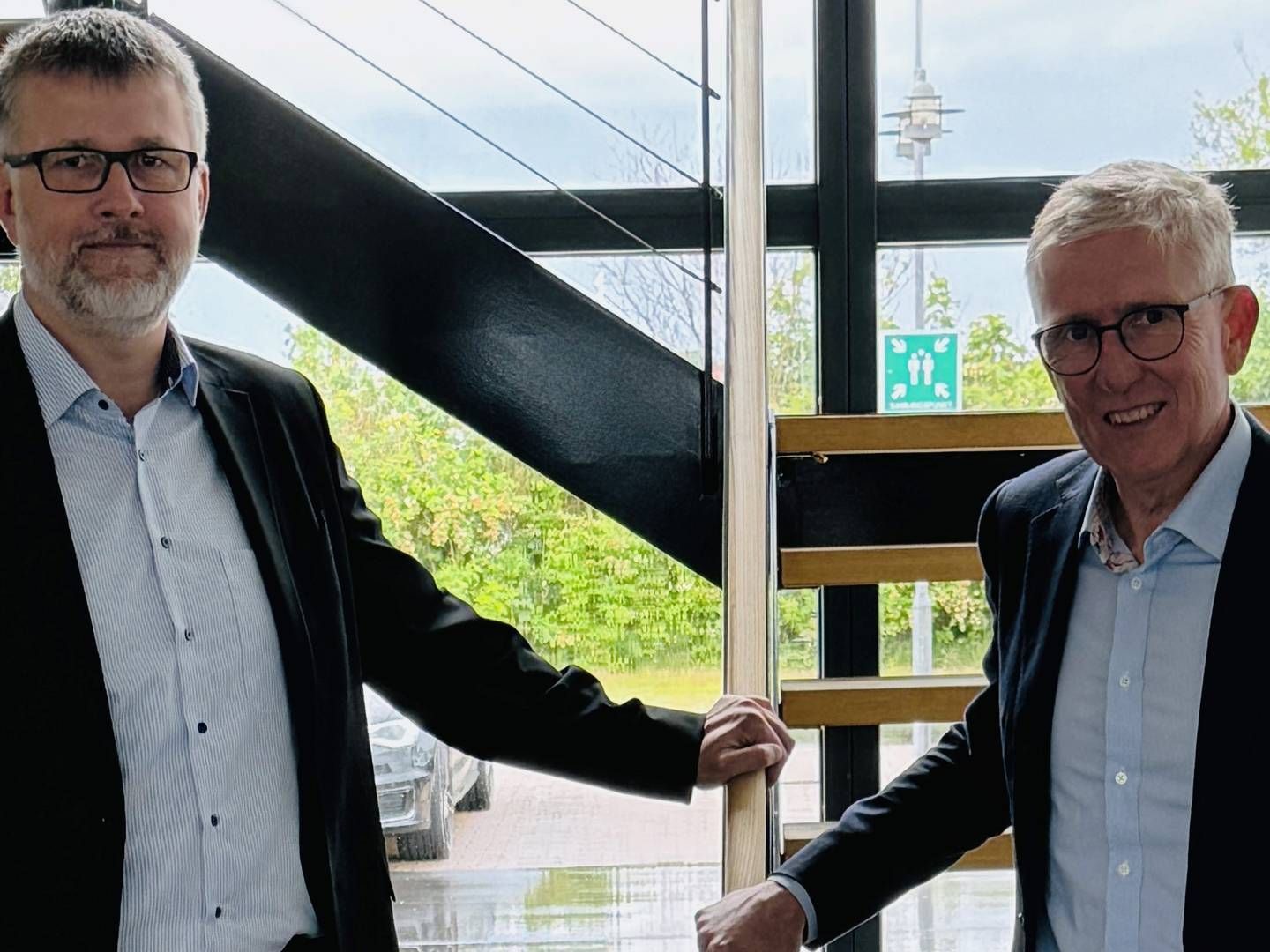 Thomas Raunsbæk, koncerndirektør hos Nordic Wood Industries, sammen med Scandi Bygs nye topchef, Henrik Mielke. | Foto: PR