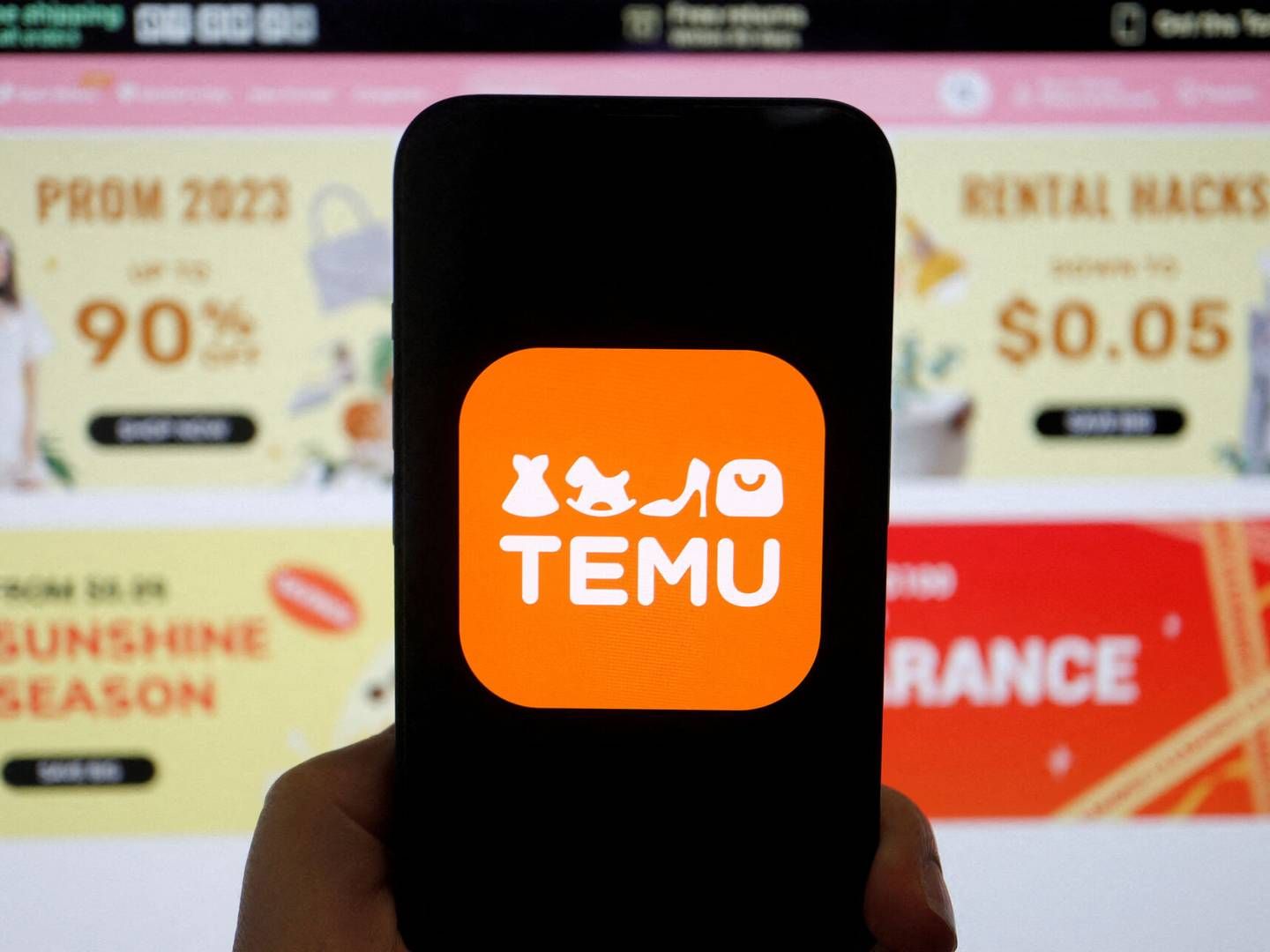 Den kinesiske handelsplatform Temu, der entrerede på det danske marked for blot otte måneder siden, er blandt de mest populære udenlandske webshops. | Foto: Florence Lo/Reuters/Ritzau Scanpix
