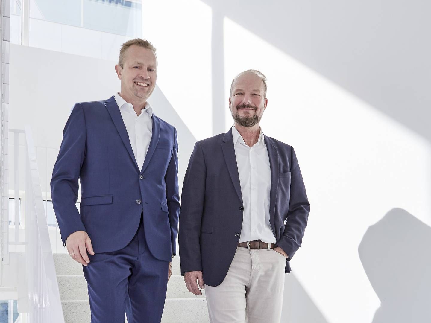 Henrik Møller Nielsen (til højre), der her står ved siden af Kristian Olaf Plet Freiesleben, der er direktør for Opennets internationale forretninger, oplever stor tysk efterspørgsel på en open acces-platform på fiberområdet. | Foto: PR