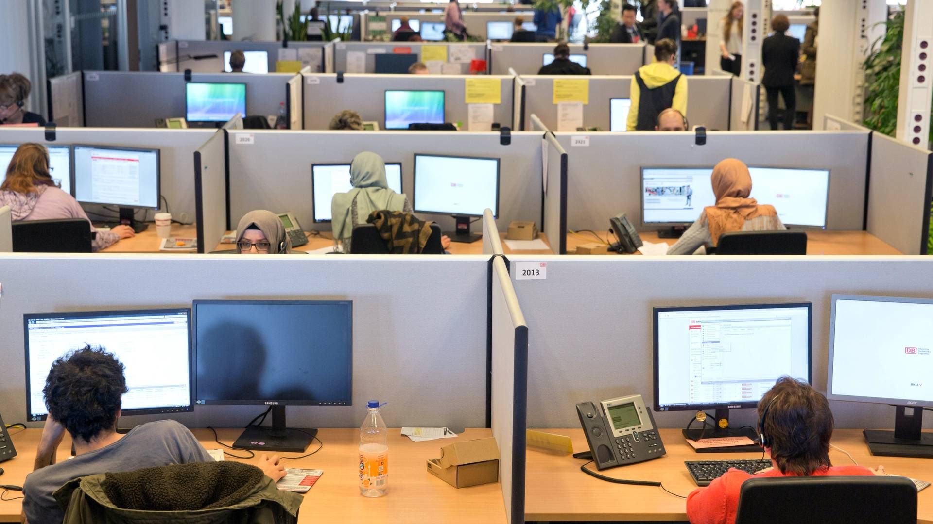 Mødebookere, der arbejder i et callcenter er et vigtigt element i pensionsmæglervirksomheden APC' forretningskoncept. Arkivfoto: Jörg Carstensen/AP/Ritzau Scanpix | Foto: Jörg Carstensen/AP/Ritzau Scanpix