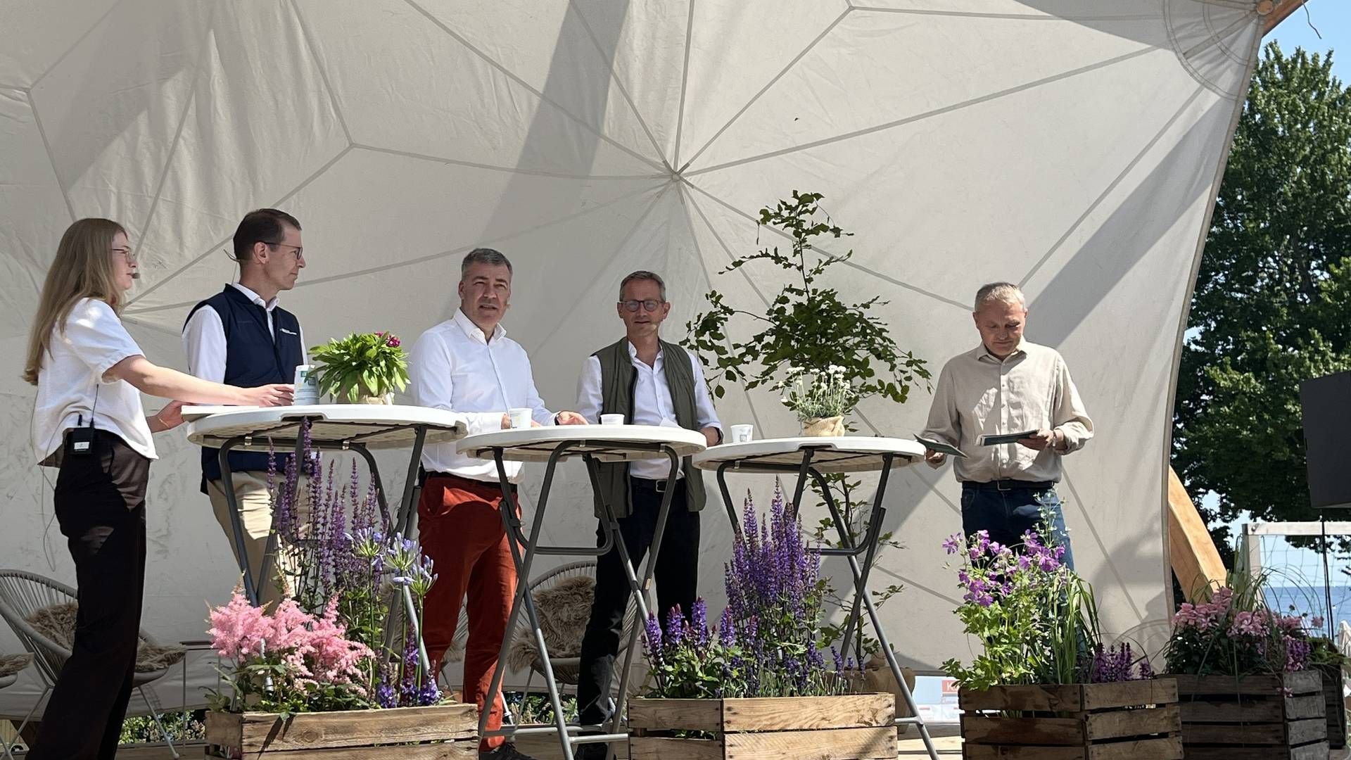 Energy Minister Lars Aagaard and Kristian Jensen from Green Power Denmark on stage at a convention in 2025. Photo is from a debate on climate and energy. Also present were Claus M. Andersen, CEO of Bornholms Energi and Nadia Gullestrup, co-founder of Gaia. | Photo: Laura Kold