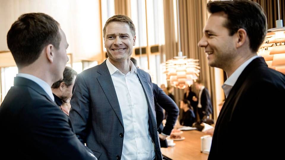 Anders Hinsby (midten), adm. direktør i Orphazyme, har grund til at smile af onsdagens børsåbning. | Foto: Thomas Lekfeldt/STF