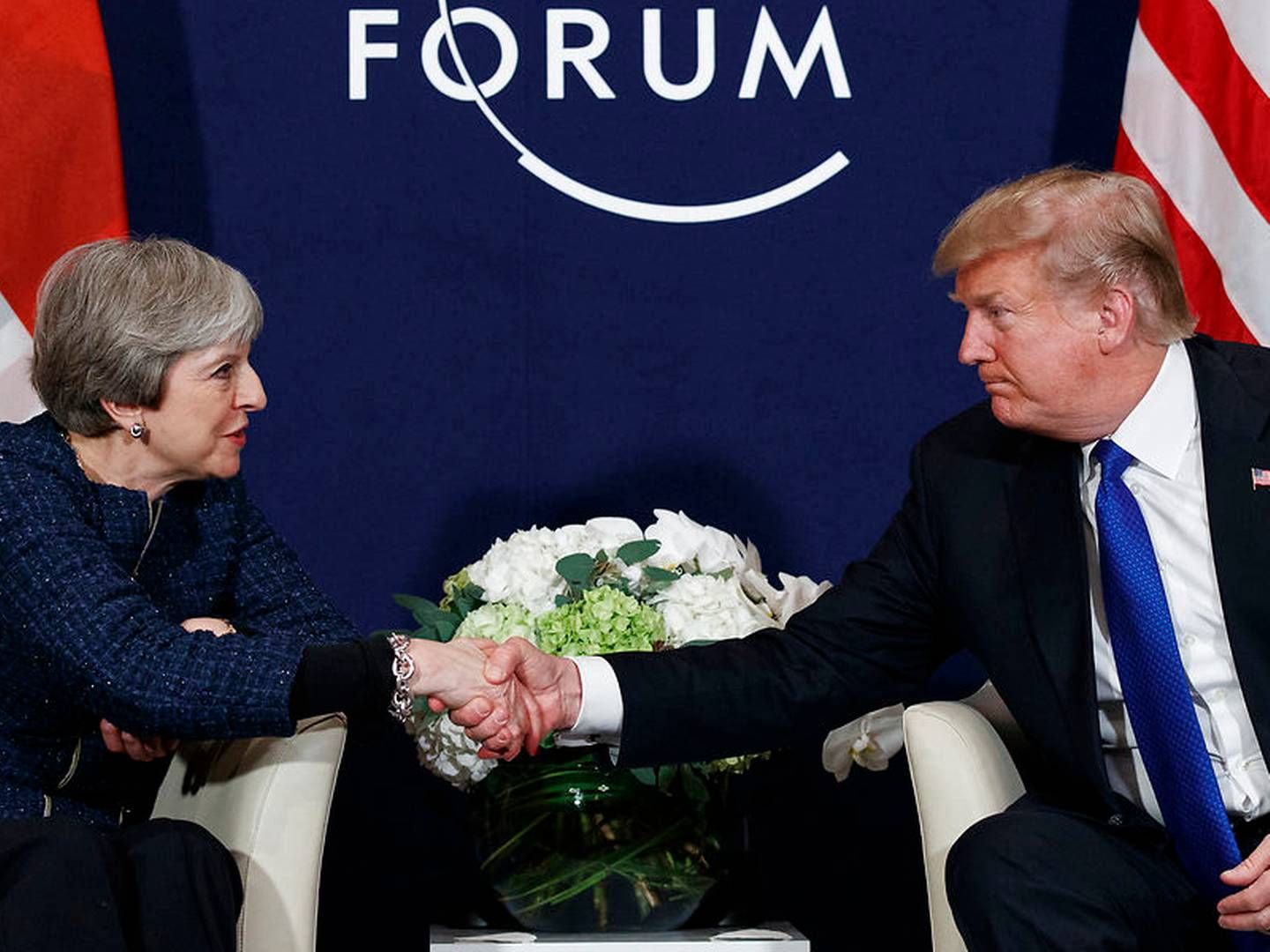 Theresa May og Donald Trump mødtes i januar i Davos i Schweiz til World Economic Forum (billedet), og mødes igen i den kommende uge, når den amerikanske præsident besøger Storbritannien. | Foto: AP/Evan Vucci