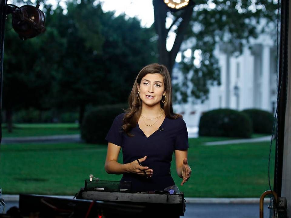 Kaitlan Collins, CNN-journalist, blev bandlyst fra et pressemøde i forbindelse med Trumps møde med Jean-Claude Juncker, efter hun havde stillet "upassende" spørgsmål til et andet event i Det Hvide Hus. | Foto: ritzau/Scanpix/Alex Brandon