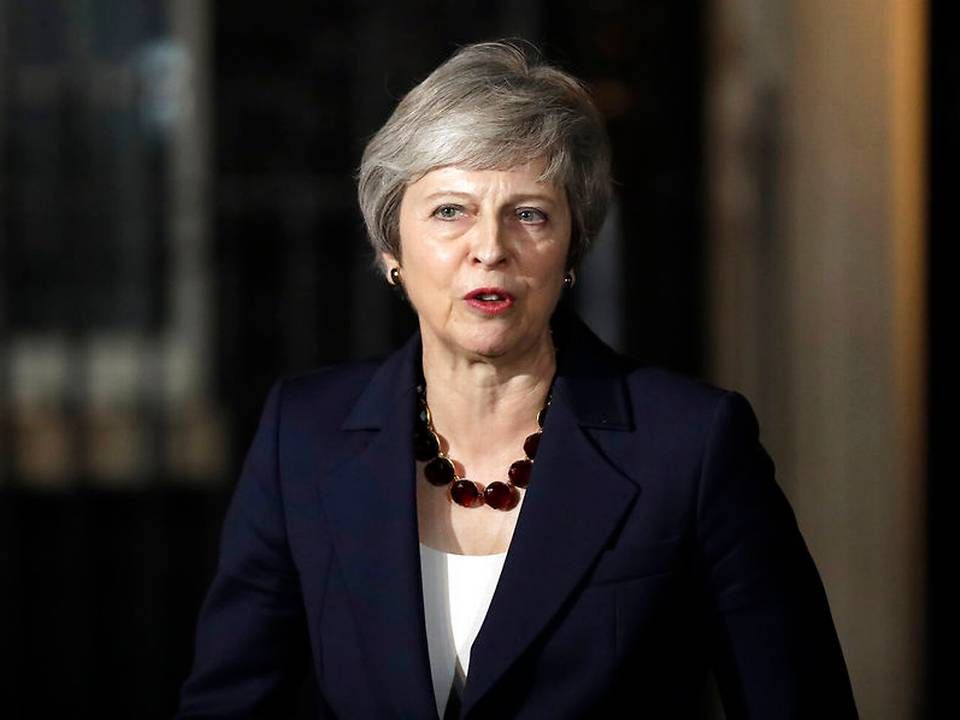Storbritanniens premierminister, Theresa May, meddelte onsdag, at hun har fået opbakning fra ministrene i landets regering til udkastet til brexitaftalen. | Foto: Ritzau Scanpix/AP/Matt Dunham