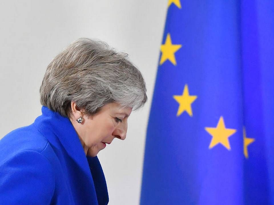 Theresa May må tilbage til EU-forhandlere i forsøget på at opnå en bedre brexit-aftale. | Foto: Emmanuel Dunand/Ritzau Scanpix