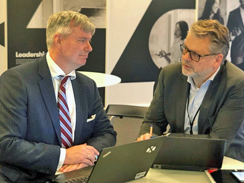 Peter Winther-Schmidt, adm. direktør i DXC Technology (tv.) og Kim Hyldig, Business Development Director i Worldline. | Foto: PR