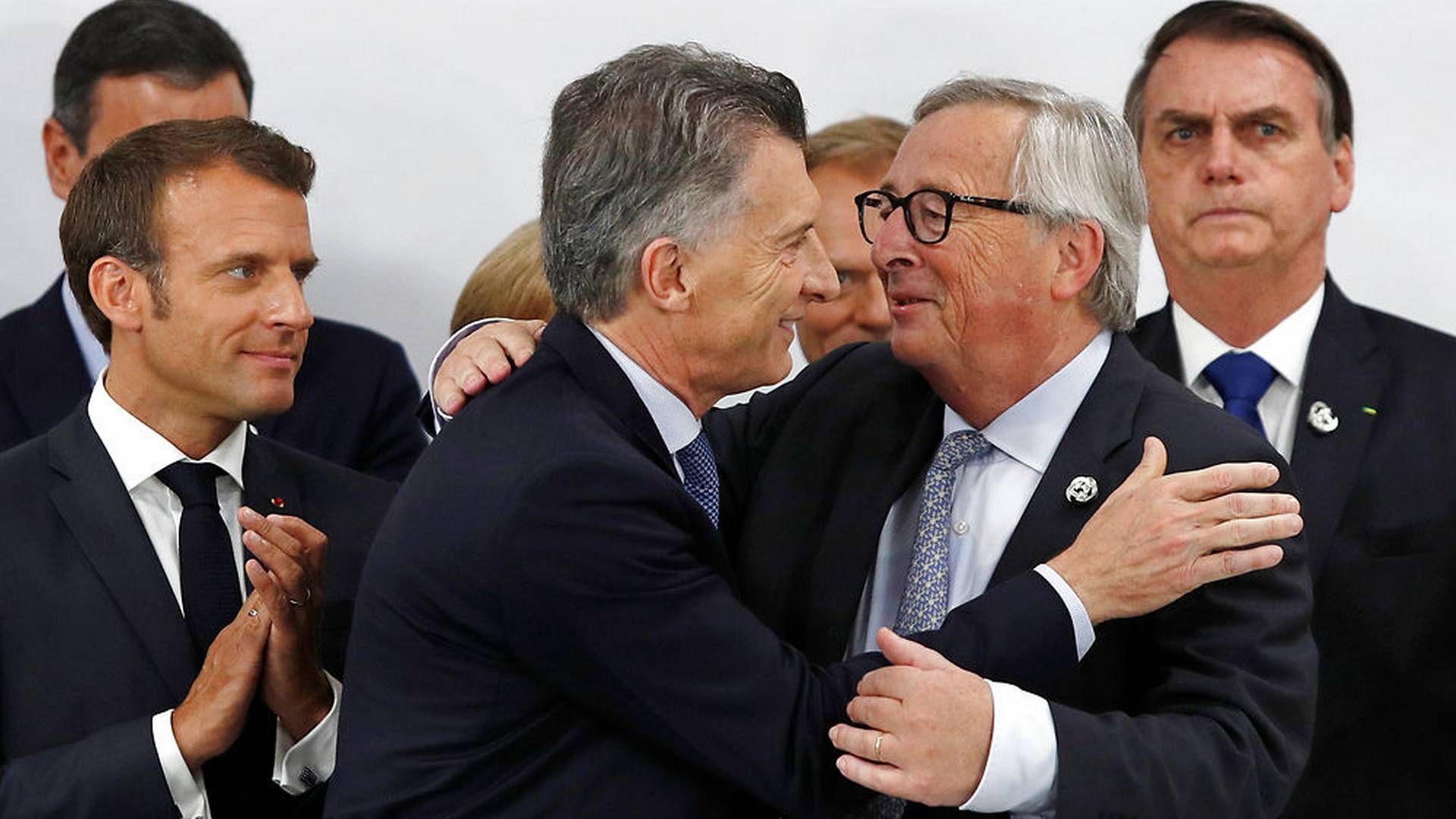 Argentinas præsident Mauricio Macri taler her med Europa-Kommissionens formand Jean-Claude Juncker ved G20-topmødet i Osaka. | Foto: Ritzau Scanpix/Reuters/Jorge Silva