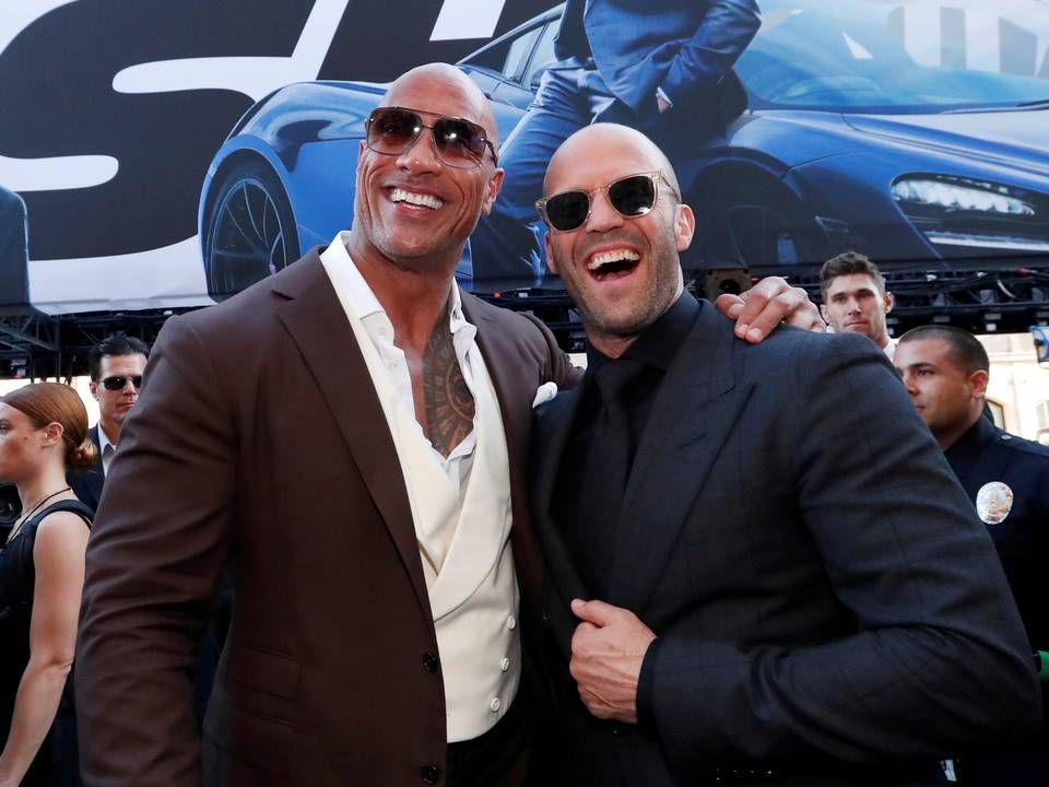 Dwayne Johnson (tv.) og Jason Statham udgør en markant del af sucessen i filmserien The Fast & Furious. Nu er Dwayne Johnson blevet medejer af norsk vandfirma. | Foto: Mario Anzuoni/REUTERS / Ritzau Scanpix