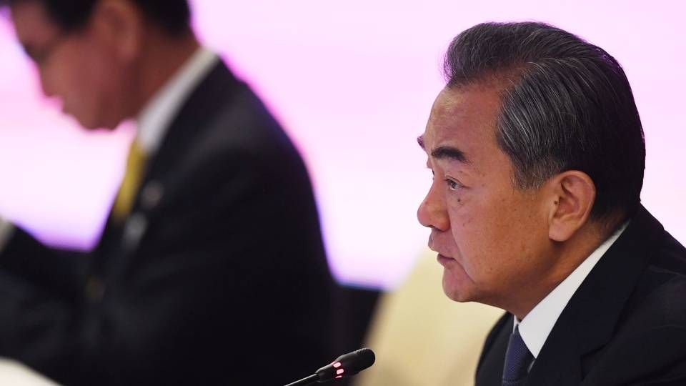 Kinas udenrigsminister Wang Yi anser USA's trussel om øgede toldsatser på kinesiske varer som et ukonstruktivt forsøg på at løse handelsstriden. | Foto: Lillian Suwanrumpha / AFP / Ritzau Scanpix
