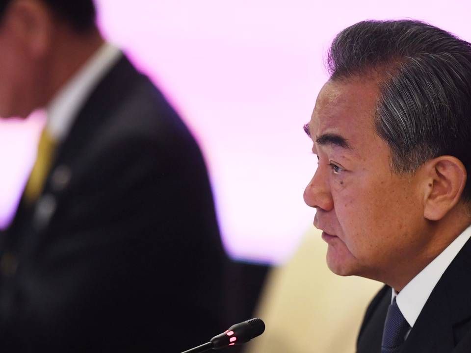 Kinas udenrigsminister Wang Yi anser USA's trussel om øgede toldsatser på kinesiske varer som et ukonstruktivt forsøg på at løse handelsstriden. | Foto: Lillian Suwanrumpha / AFP / Ritzau Scanpix