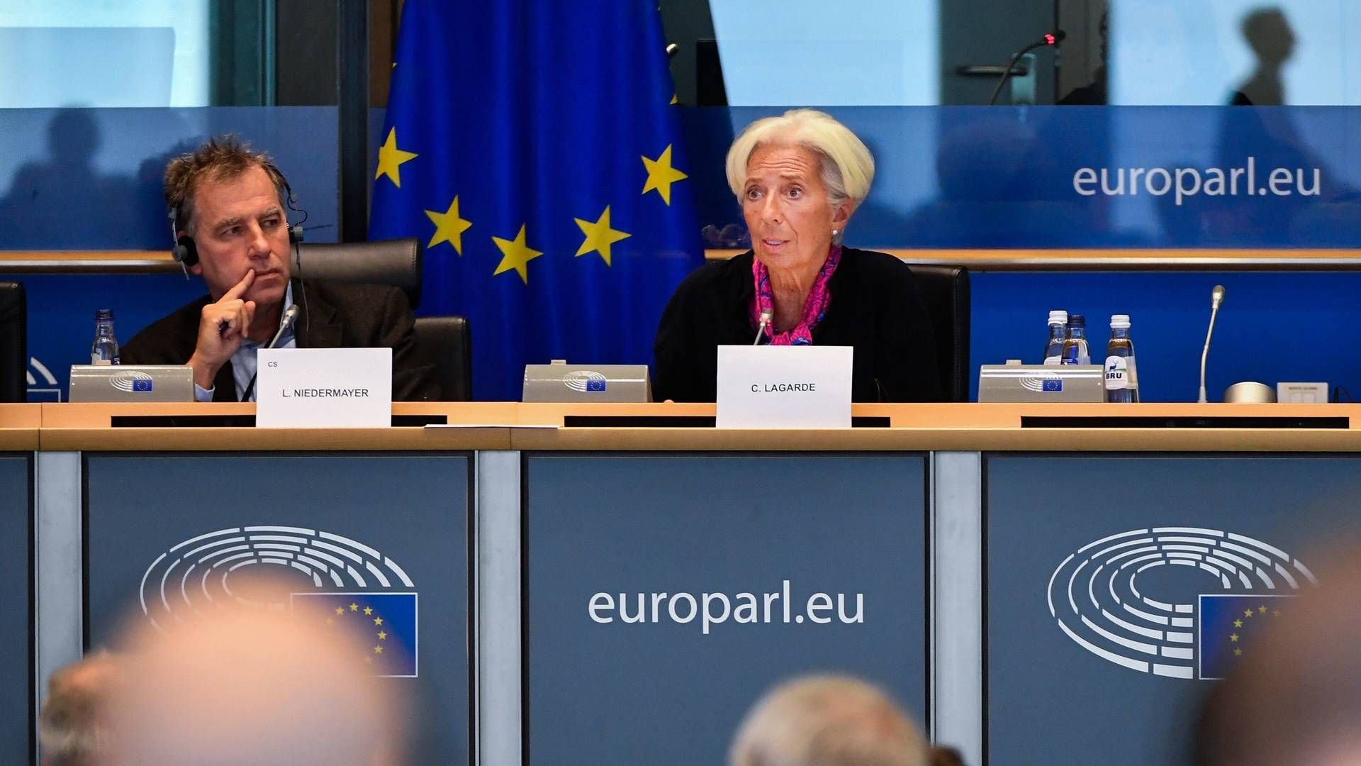 French President-designate of the European Central Bank (ECB) Christine Lagarde (R) speaks prior's to attend a European Parliament's Committee on Economic Affairs with the Vice chair of Committee on Economic and Monetary Affairs Ludek Niedermayer (L) at the EU Parliament, in Brussels, on September 4, 2019. | Photo: JOHN THYS/AFP / AFP