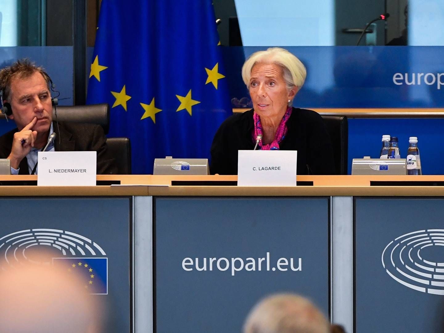 French President-designate of the European Central Bank (ECB) Christine Lagarde (R) speaks prior's to attend a European Parliament's Committee on Economic Affairs with the Vice chair of Committee on Economic and Monetary Affairs Ludek Niedermayer (L) at the EU Parliament, in Brussels, on September 4, 2019. | Photo: JOHN THYS/AFP / AFP