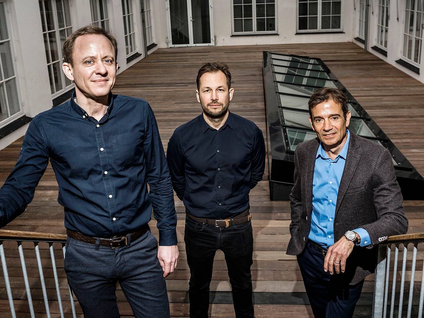 Templafys adm. direktør Jesper Theill Eriksen (tv.), bestyrelsesformand Preben Damgaard (th.) og produktchef Christian Lund (midten). | Foto: Thomas Lekfeldt / Ritzau Scanpix