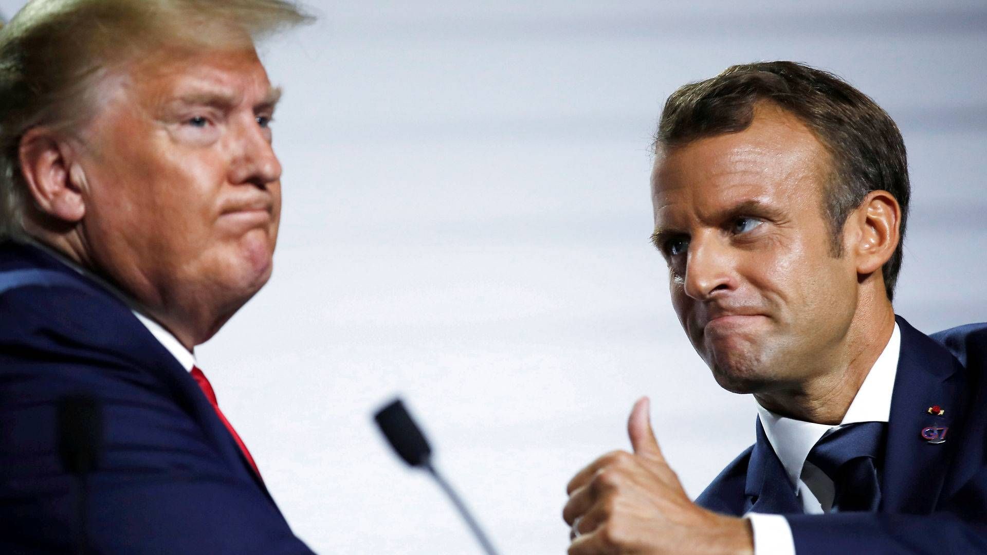 Præsident Donald Trump (tv) har indtil nu tilladt, at den franske præsident Emmanuel Macron pålægger mange amerikanske teknologi-selskaber en ekstraskat i forsøget på at komme international skattespekulation til livs. | Foto: Carlos Barria/Reuters/Ritzau Scanpix