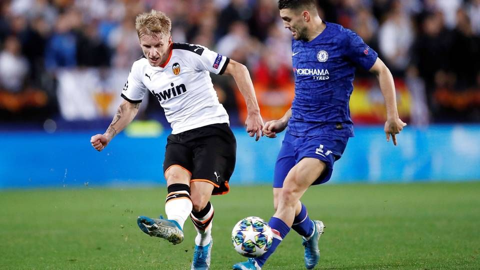 Danske Daniel Wass (tv) i aktion for Valencia i en Champions League-kamp mod Chelsea i november. | Foto: Andrew Boyers/Reuters/Ritzau Scanpix