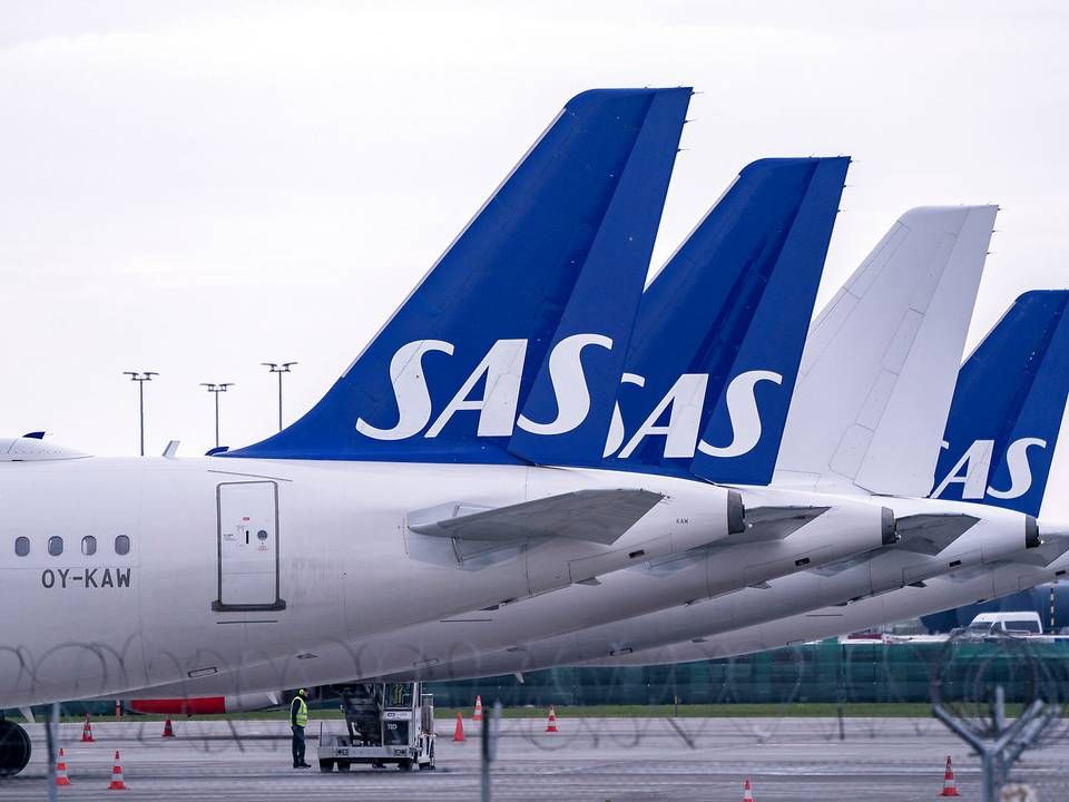 SAS-fly holder på jorden i Københavns Lufthavn, og her gør det ondt, at flyselskabet skal massefyre. | Foto: Tt News Agency/Reuters/Ritzau Scanpix