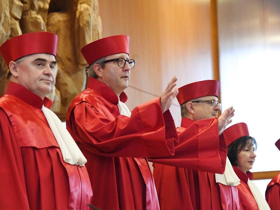 Dommerne ved den tyske forfatningsdomstol er særligt kendt for deres røde rober. | Foto: Uli Deck/AP/Ritzau Scanpix