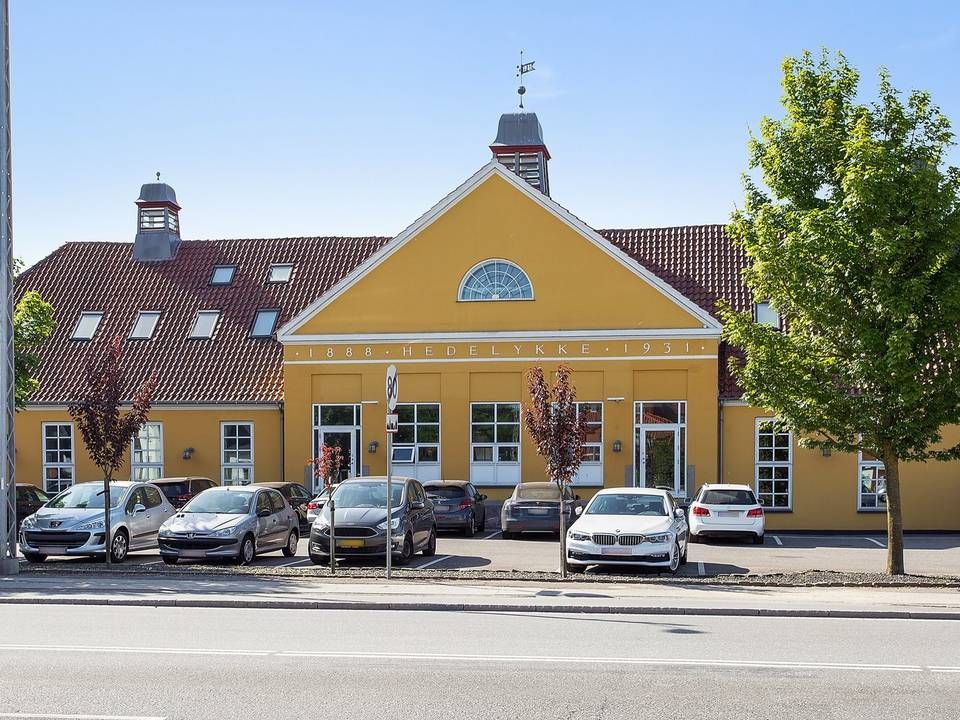Ejendommen Hedelykke har været mejeri i over 100 år, men er i dag omdannet til en bolig- og erhvervsejendom. | Foto: PR / EDC Erhverv Poul Erik Bech