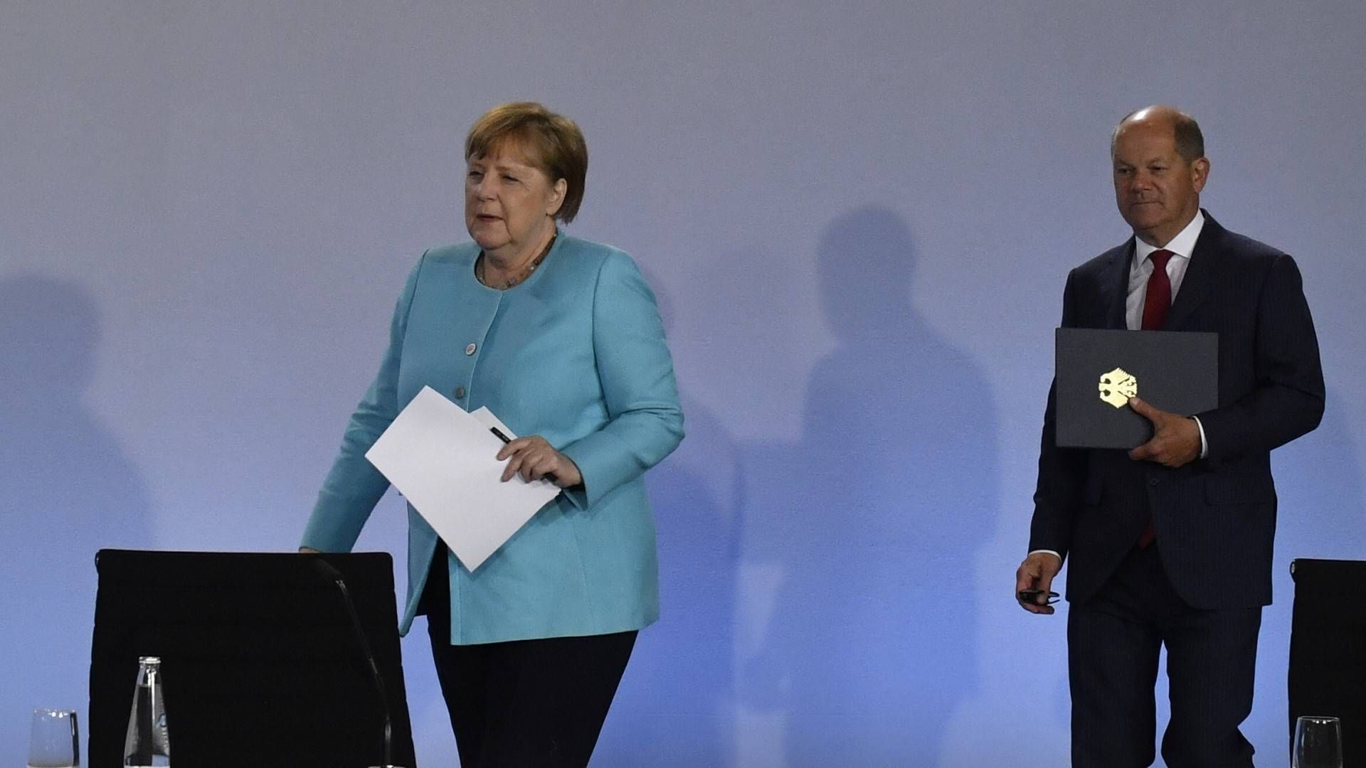 Angela Merkel und Olaf Scholz | Foto: picture alliance / AP Images