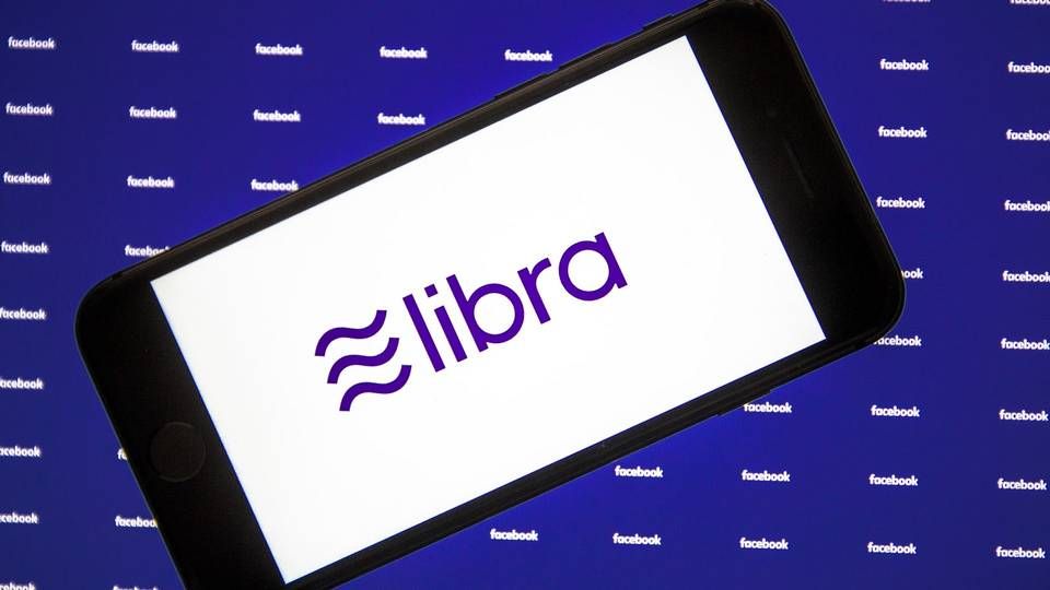 Libra Logo, abgebildet auf einem Smartphone (Illustration) | Foto: picture alliance / AA