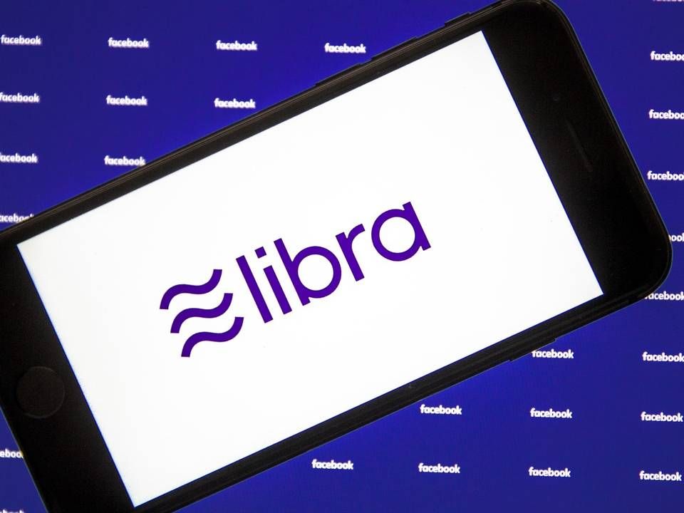 Libra Logo, abgebildet auf einem Smartphone (Illustration) | Foto: picture alliance / AA