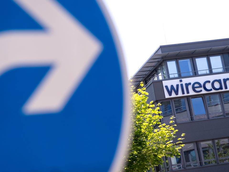 Verkehrsschild vor der Firmenzentrale von Wirecard. | Foto: picture alliance/Sven Hoppe/dpa