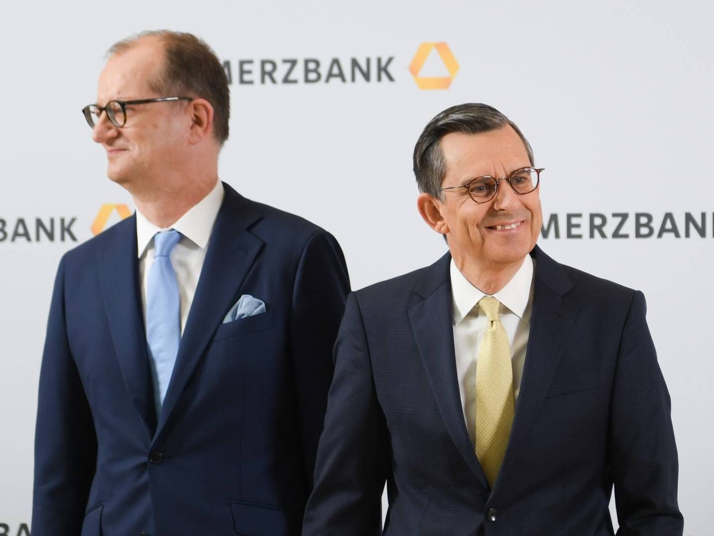 Martin Zielke (l), Vorstandsvorsitzender der Commerzbank, und Stefan Schmittmann, Aufsichtsratsvorsitzender | Foto: picture alliance/Arne Dedert/dpa