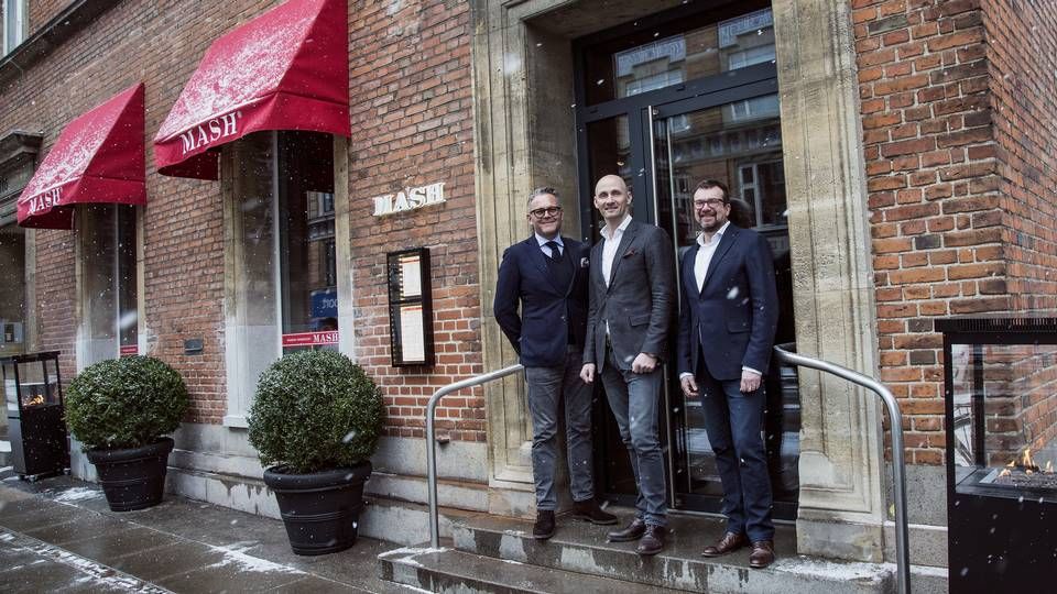 Hovedaktionær Jesper Boelskifte (midt) ejer sammen med Mikkel Glahn (tv) og Erik Gemal (th) restaurantkæden Mash, der står for modern american steakhouse. I 2009 åbnede den første restaurant i Bredgade i København. | Foto: PR/Copenhagen Concepts