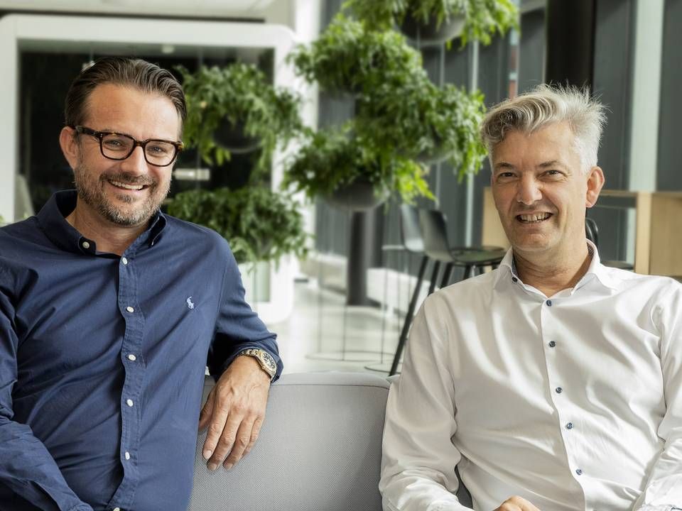 Ulrik Ahrendt-Jensen, adm. direktør i OK-Fonden (tv.), og Allan Polack, koncernchef i PFA. | Foto: PR / PFA