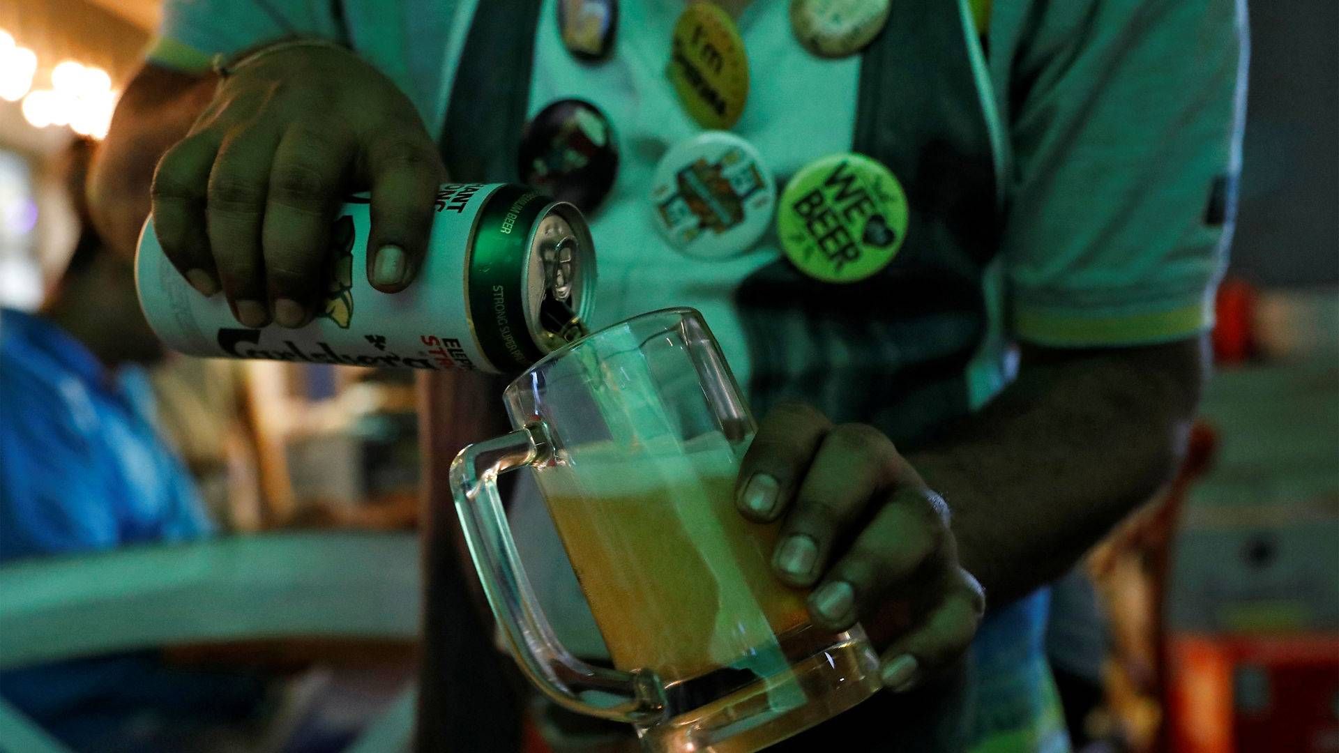 Carlsberg og bryggeriets parner i Indien er røget alvorligt i infight om millioner af kroner. | Foto: Danish Siddiqui/Reuters/Ritzau Scanpix