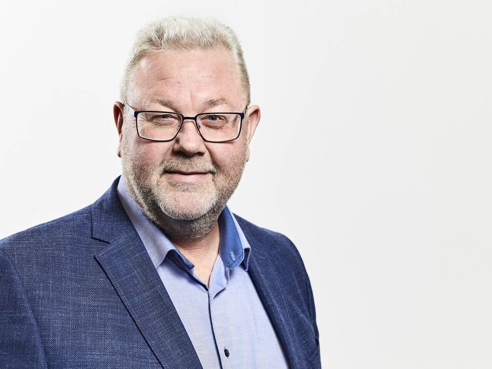 Claus E. Petersen, adm. direktør i Den Jyske Sparekasse, ser den vigende toplinje, som et af den børsnoterede sparekasses største problemer. | Foto: PR