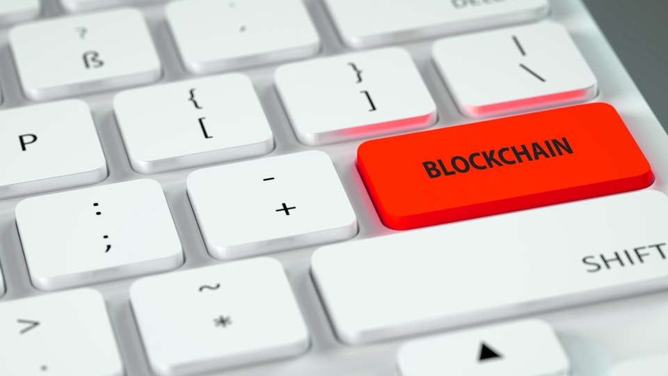 Weiße Computertastatur,rot belegte Sondertaste mit Aufschrift Blockchain | Foto: picture alliance / Bildagentur-online/McPhoto | Bildagentur-online/McPhoto