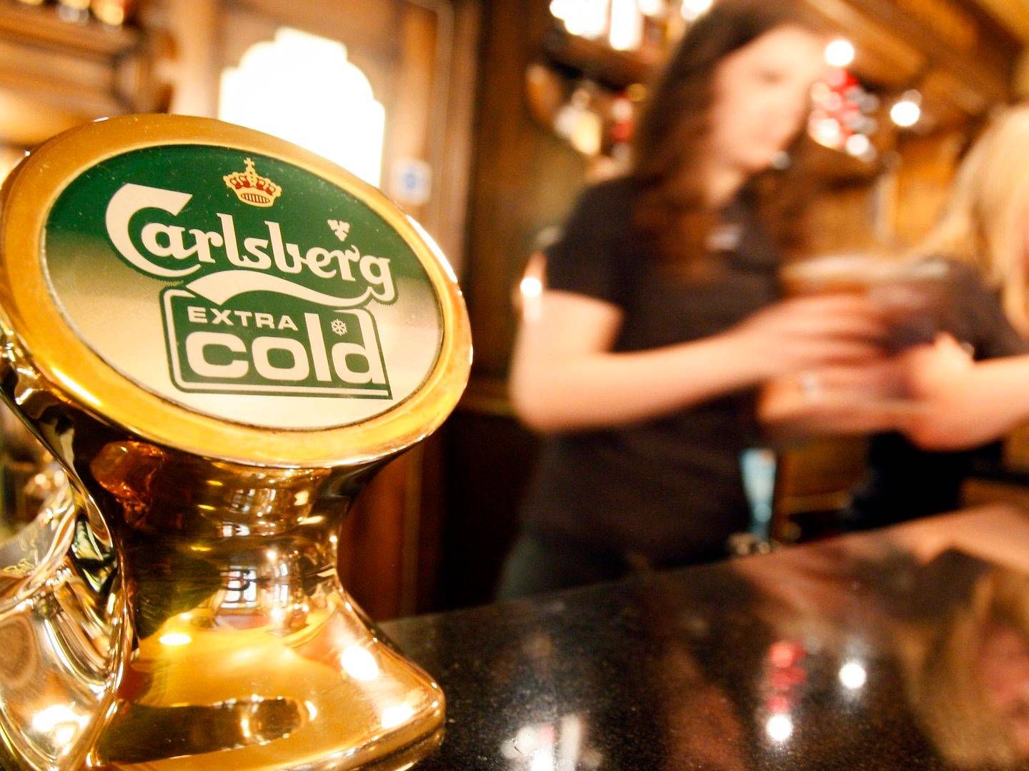 Ølhanerne har stået stille mange steder i år, men alligevel har Carlsberg købt sig ind i den britiske pubmarked i år.