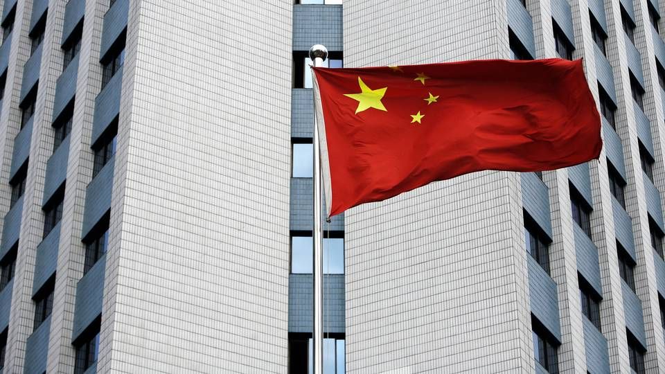 Det kinesiske flag med stjerner i Beijing i Kina. | Foto: Thomas Borberg