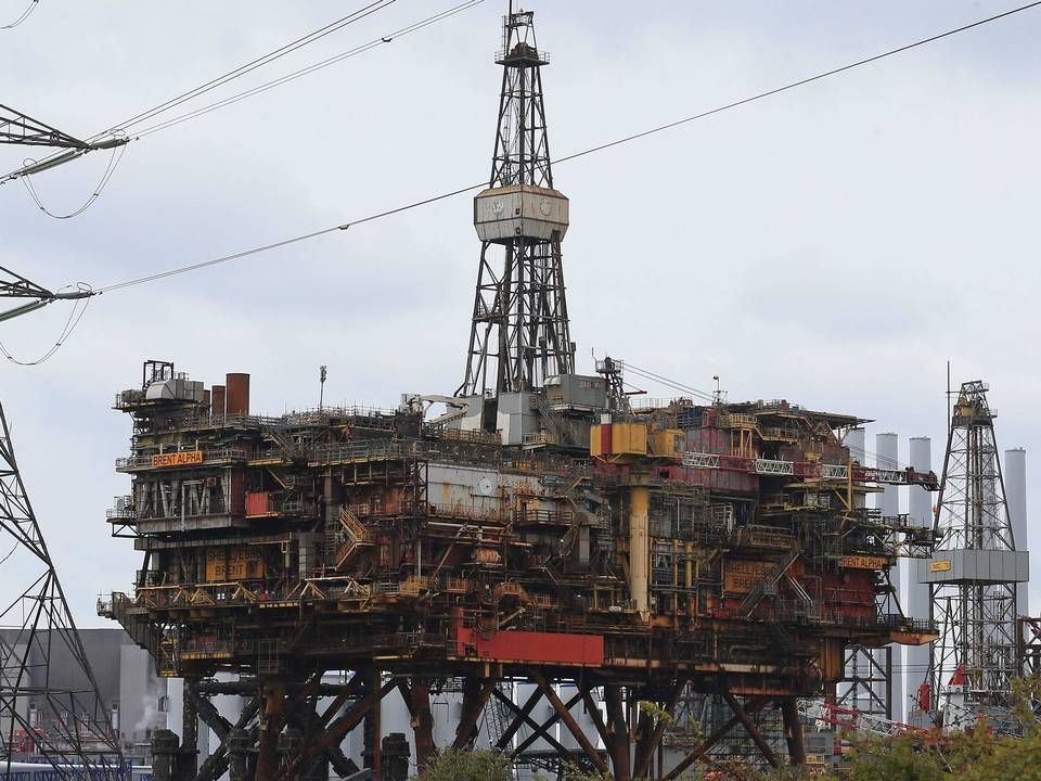Et af symbolerne på Nordsøens olie, Shells gamle Brent Alpha-platform, er i disse dage ved at blive skåret op og skrottet. | Foto: LINDSEY PARNABY/AFP / AFP